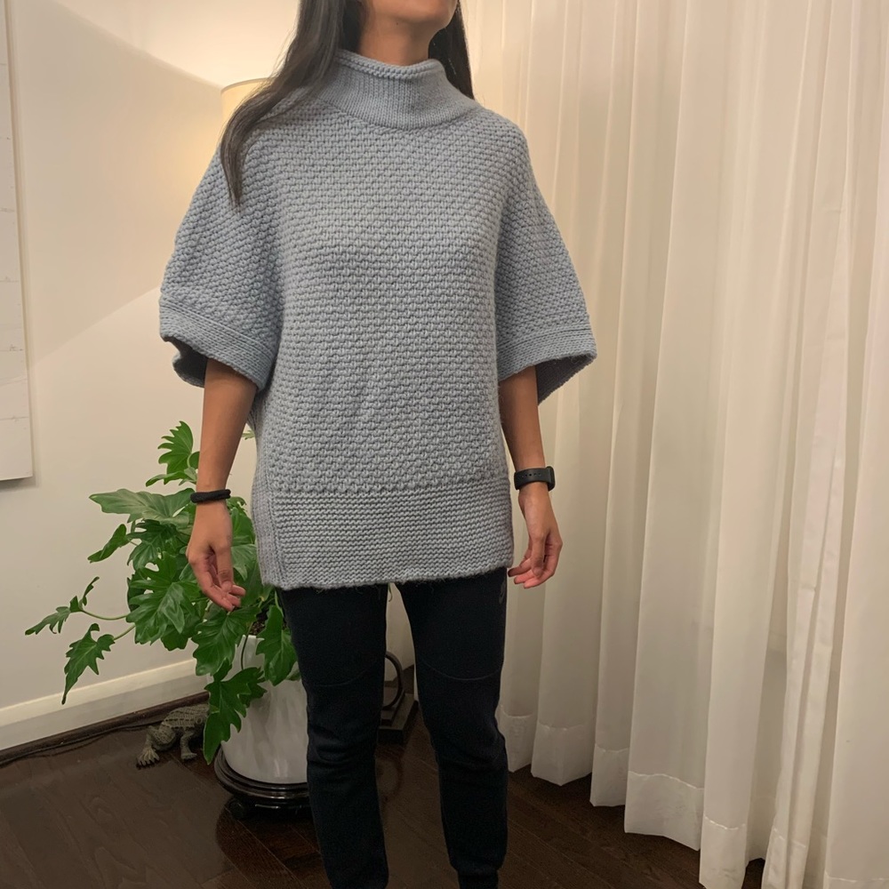 Blue knit poncho sweater